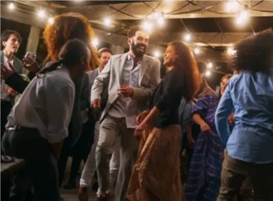 Interracial couple with diverse group of friends